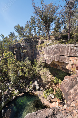 View from the top of the virtually dry waterfall at the top of Rainbow Waters (Gudda Gumoo) gorge in Blackdown Tableland National Park, Queensland, Australia. photo