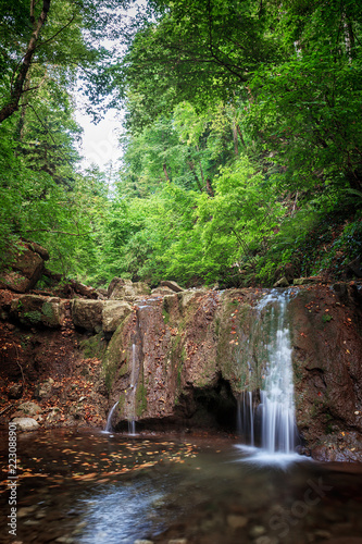 Kaverzinsky small waterfall in the Caucasus mountains. Russia, Krasnodar region