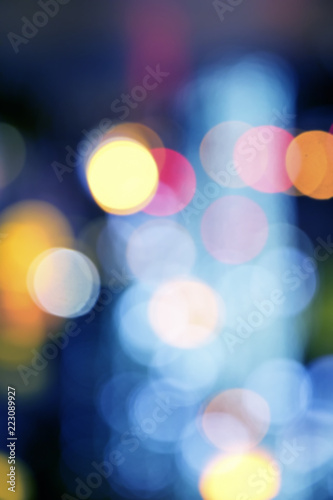 Blurry background image of defocused colorful lights at night