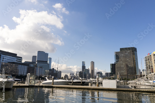 Docklands  Melbourne  Victoria  Australia. Waterfront buildings and marina  water and glass sparkling in sunshine.