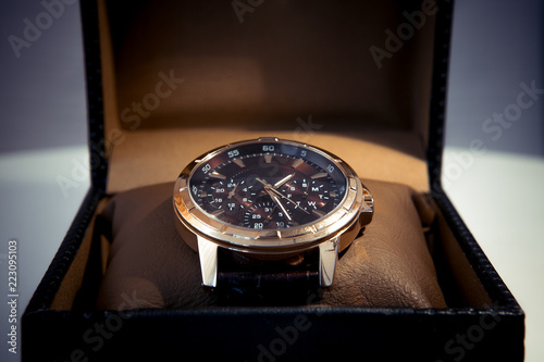 Luxury mens wristwatch displayed and packaged in a box