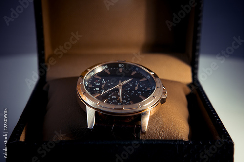 Luxury mens wristwatch displayed and packaged in a box