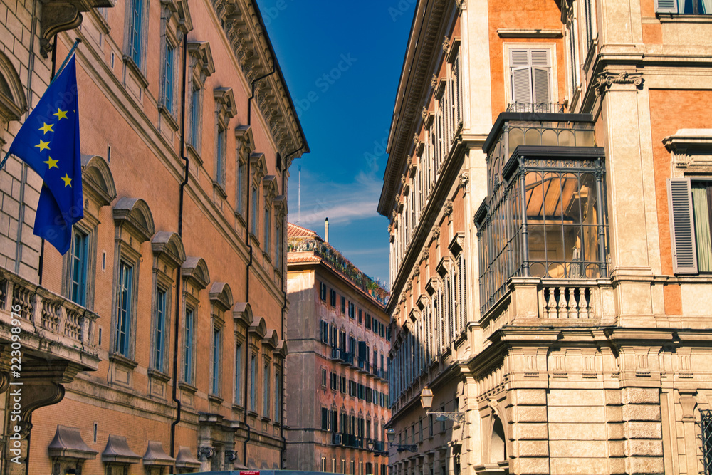 Buildings seem to merge on narrow street in Rome, Italy