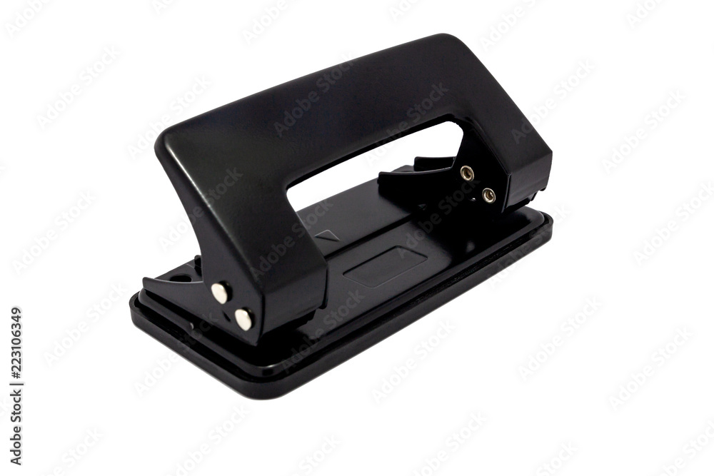 Black paper hole puncher, office tool equipment that is used to create  holes in sheets of paper, isolated on a white background, with clipping  path Stock Photo