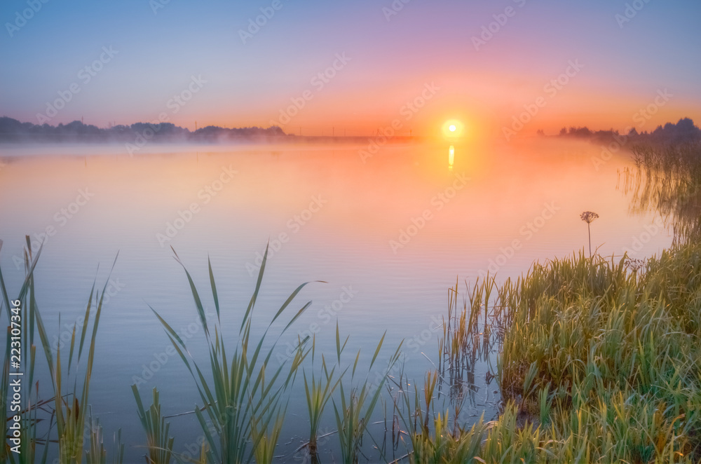 Autumn sunrise over the lake