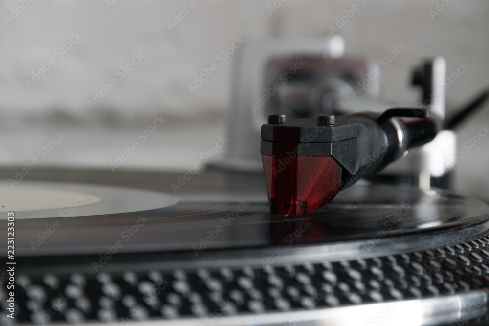 Vinyl record with needle on turntable Vinyl record with needle on turntable