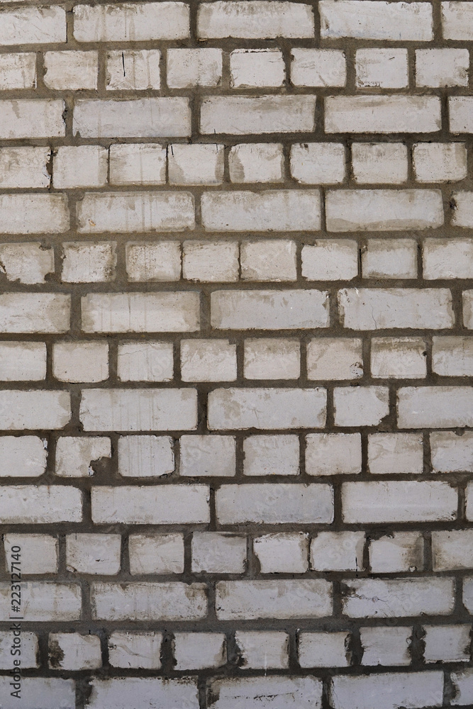 Wall of white old brick. Backgrounds, texture