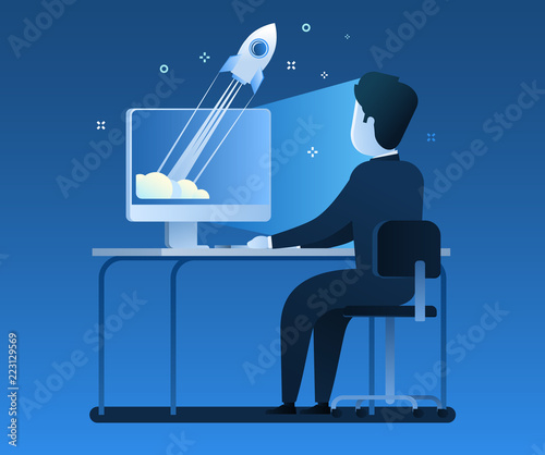 Businessman standing by the desk with a laptop, a rocket is starting from the laptop. Business startup concept. Successful launch of Internet project