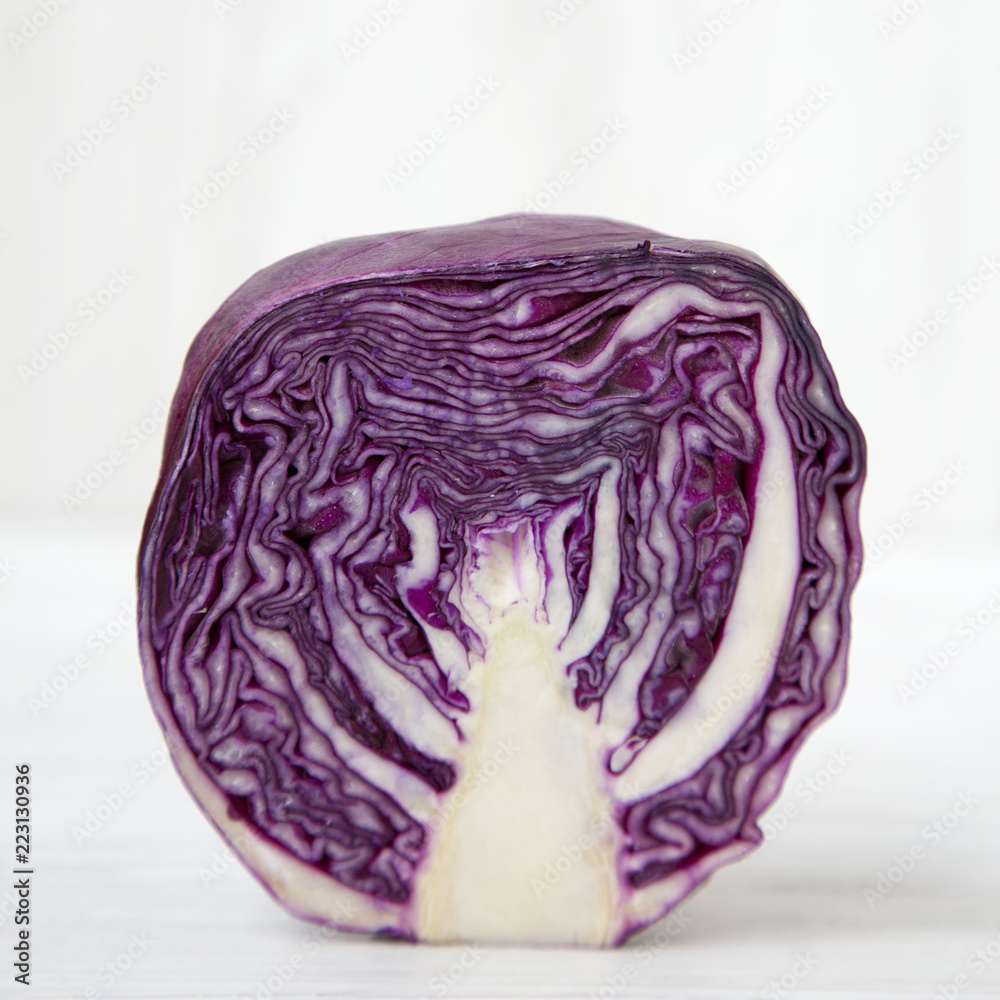 Half of red cabbage, close-up. Side view. Half of red cabbage, close-up. Side view.