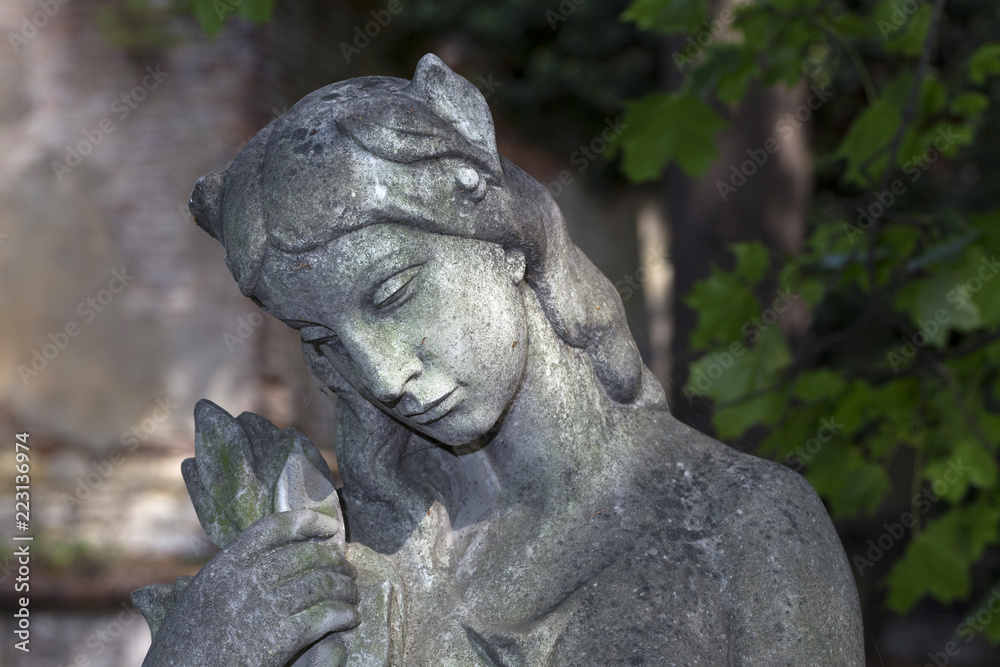 Historic Statue on the mystery old Prague Cemetery, Czech Republic Historic Statue on the mystery old Prague Cemetery, Czech Republic