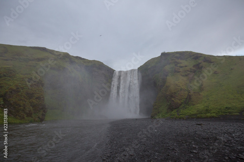 waterfall in iceland in the mountain