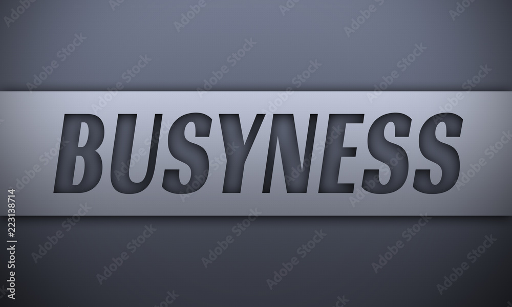 busyness - word on silver background