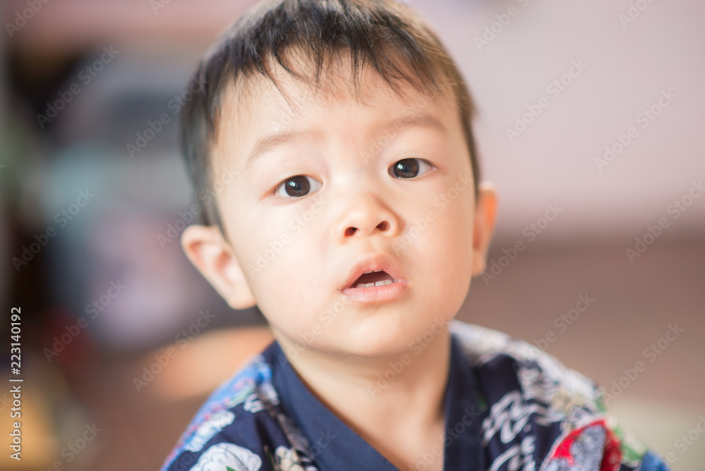 Little toddler boy draw pictures on a paper by use pencil Little toddler boy draw pictures on a paper by use pencil