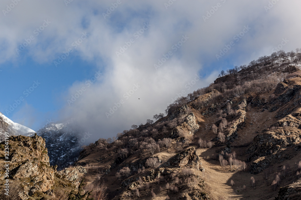 beautiful winter mountains of the Kavkaz in the clouds