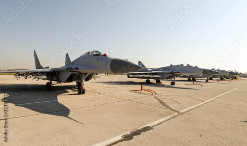 Military jets on airport tarmac photo