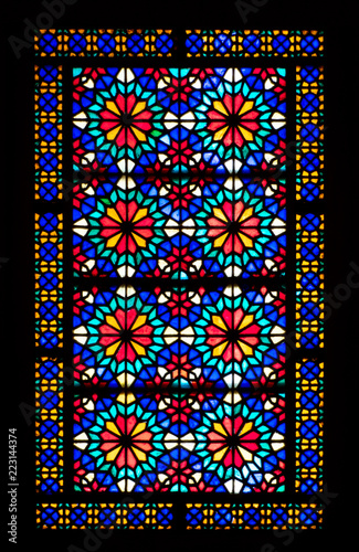 Stained glass window in Dolat Abad Garden, Yazd, Iran photo