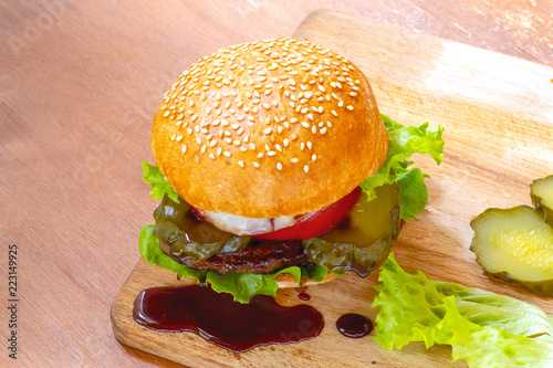 Burger on a wooden board