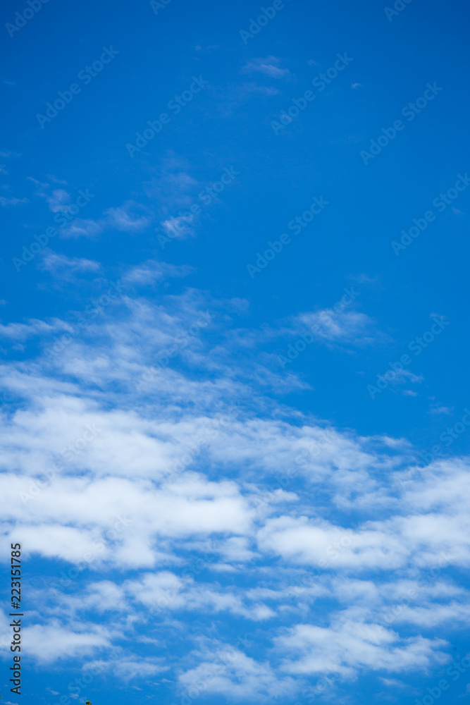 Blue sky with clouds background.Sky daylight. Natural sky composition. Element of design. Blue sky with clouds background.Sky daylight. Natural sky composition. Element of design.