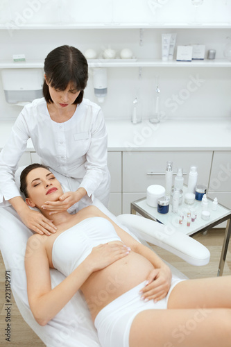 Face Cosmetology. Facial Massage For Pregnant Woman At Clinic