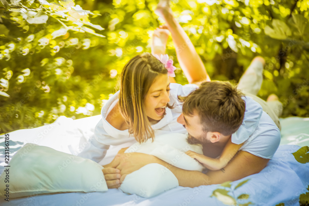 Have fun and share love . Young couple at nature.