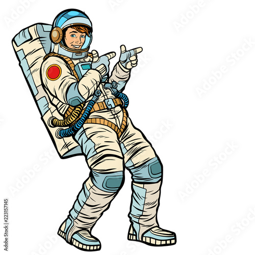 Astronaut young man points. isolate on a white background