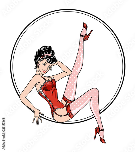 Pin-up classic sexy woman in red corset and pink dotted stocking