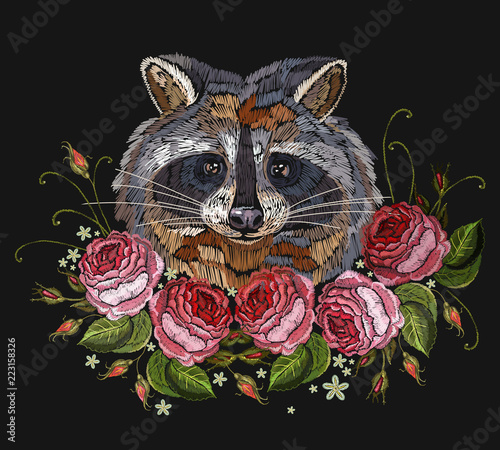 Raccoon head and roses embroidery art. Fashion template for clothes, textiles, t-shirt design. Classical embroidery portrait of funny raccoon and pink flowers roses