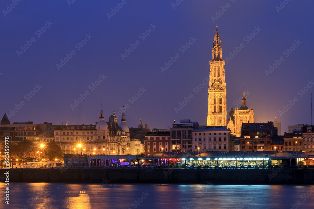 Beautiful cityscape of the skyline of Antwerp, Belgium, during the blue hour seen from the shore of the river Scheldt