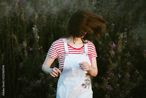portrait of a young girl outdoors
