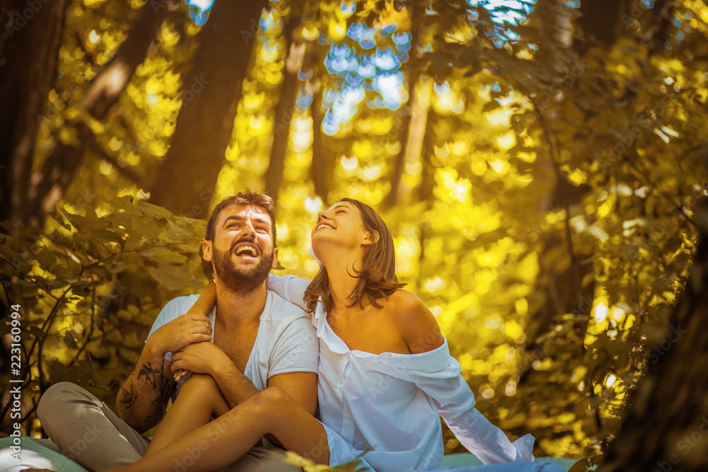 Portrait of young happy couple in nature. Portrait of young happy couple in nature.
