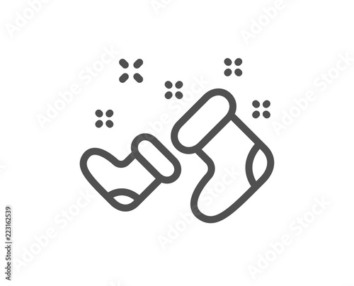 Santa boots line icon. Christmas or New year sign. Claus symbol. Quality design element. Classic style christmas boots. Editable stroke. Vector