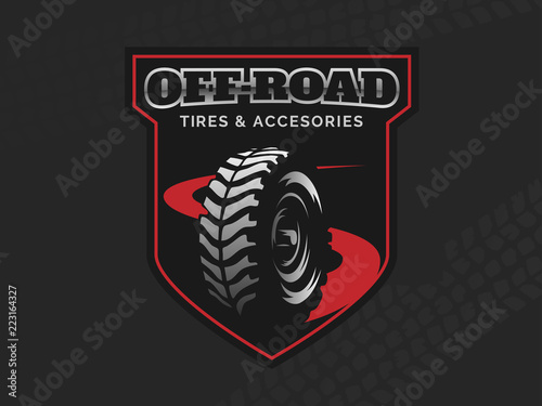 Offroad tires store emblem on dark backgound.