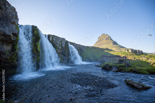 waterfall in iceland in the mountain