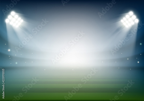 Blank football field on the stadium. Sports background illuminat