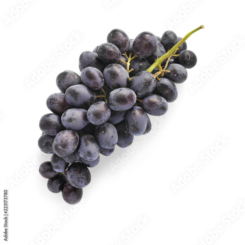 Black grapes isolated on white background, top view.