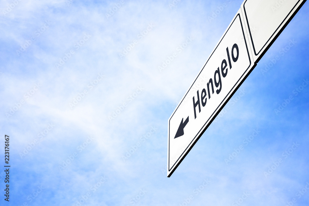 Signboard pointing towards Hengelo
