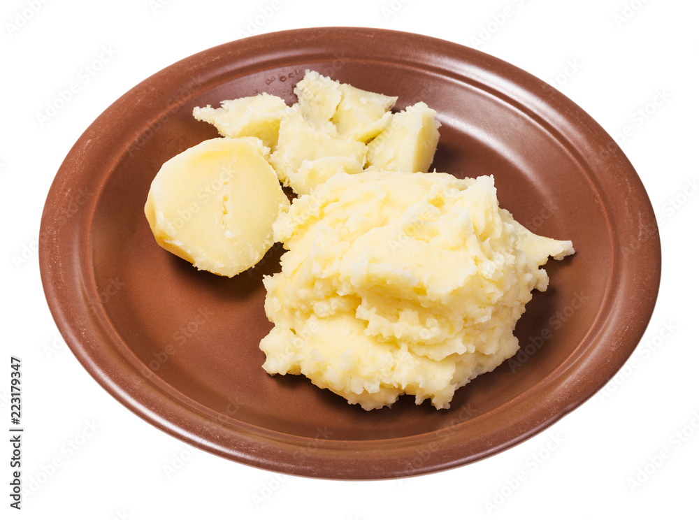 boiled and mashed potatoes on plate isolated