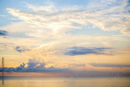 Sunrise in sea the morning amidst the clouds and the sky is beautiful quiet atmosphere feeling lonely