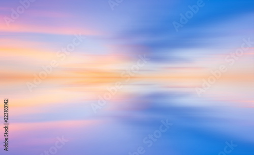 Abstract sunset motion blurred background colour.