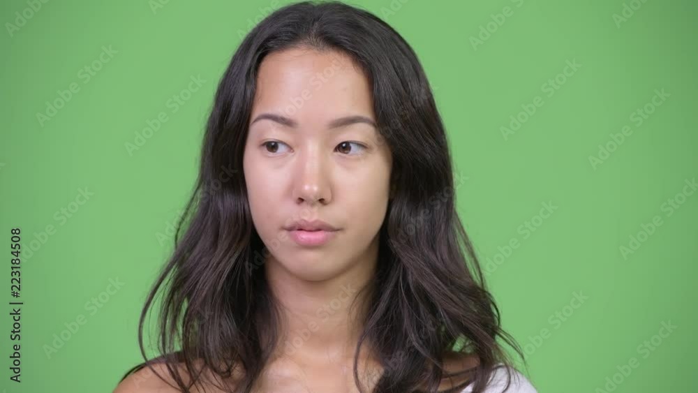 Young beautiful multi-ethnic woman looking bored Young beautiful multi-ethnic woman looking bored