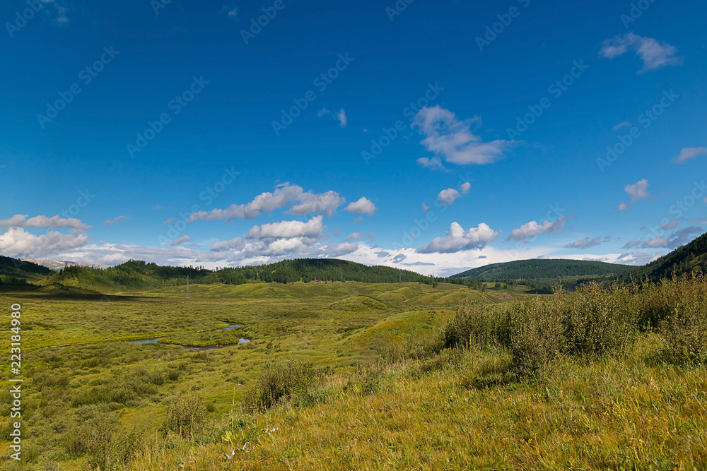 Green hills of the Altai mountain in a summer day, Russia Green hills of the Altai mountain in a summer day, Russia