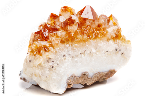 Cuadro en lienzo Macro mineral stone Citrine in rock in crystals on a white background