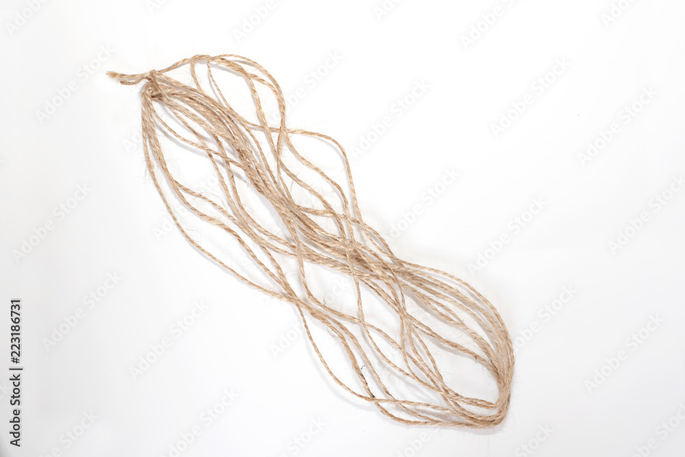 Jute in a roll on a white sheet Jute in a roll on a white sheet