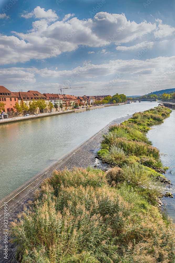 Main river, plants, old city and beautiful sky in Wurzburg, Germany