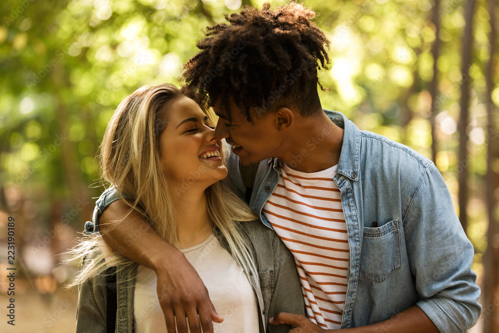 Lovely young multiethnic couple spending time together Lovely young multiethnic couple spending time together