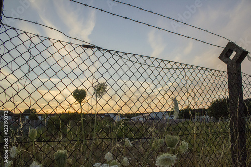 Secured barbed border line 