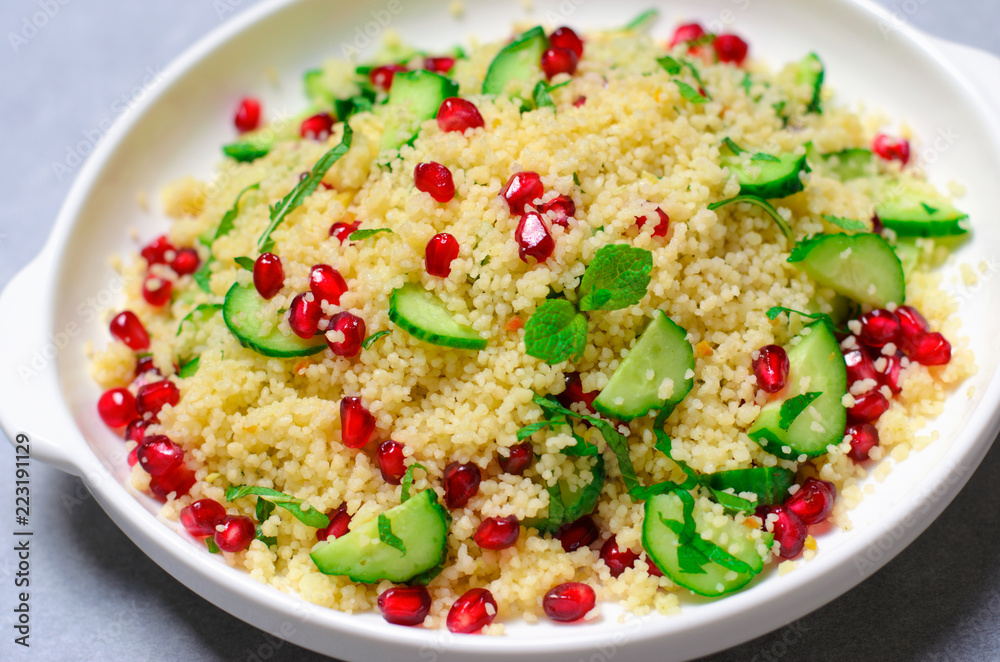 Couscous Salad with Pomegranate, Mint and Cucumbers, Healthy Salad, Vegan Meal Couscous Salad with Pomegranate, Mint and Cucumbers, Healthy Salad, Vegan Meal