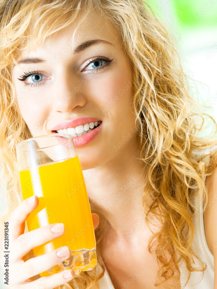 Happy woman drinking juice Happy woman drinking juice