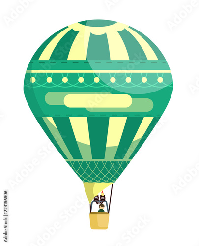 Green and yellow flat hot air balloon with pattern and a man in the basket on festival or holiday