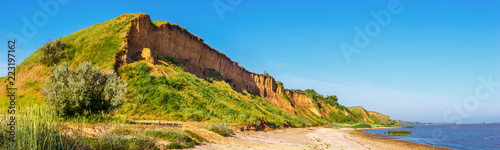 The hill with the landslip side on the seashore. Russia, Azov sea, Taganrog bay photo